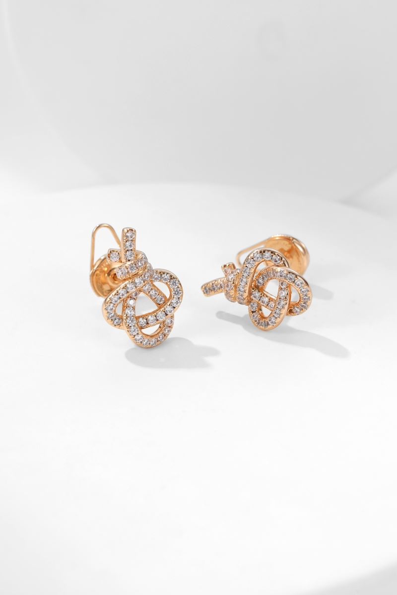 T*f*ny earrings